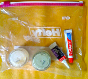 Example of a carry-on toiletry bag with only items that are needed in flight or hard to find later